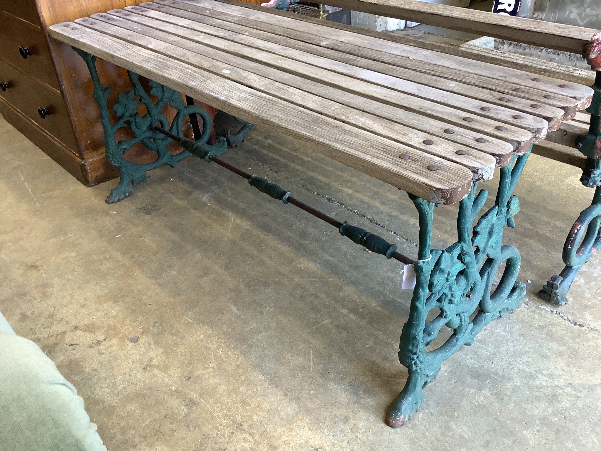 A Victorian Coalbrookdale painted cast iron Serpent and Grape pattern slatted garden bench and table, bench with cast hounds head terminals, table W-160, D-55, H-64, bench W-160, D-65, H-76cm.